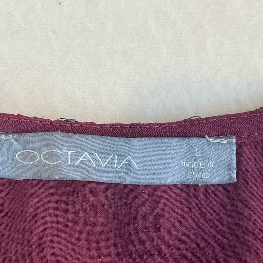 Octavia sleeveless embroidered tunic top. Fully lined. In new like condition.LG